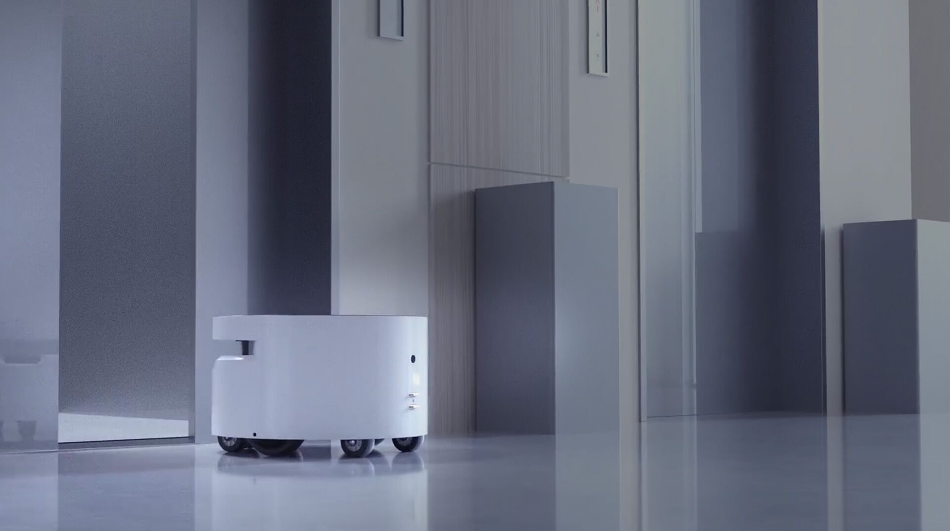 Robot autonomously using building elevator