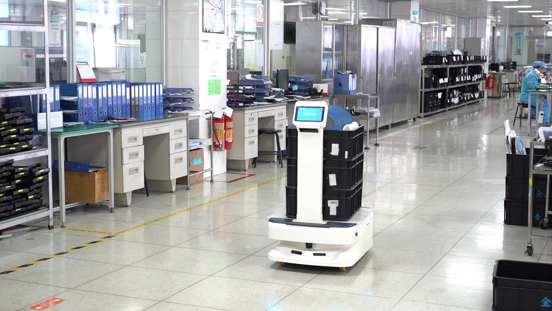 Warehouse automation facility with robotic equipment